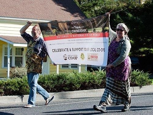 photo of parade celebrating National Co-op Month 2015