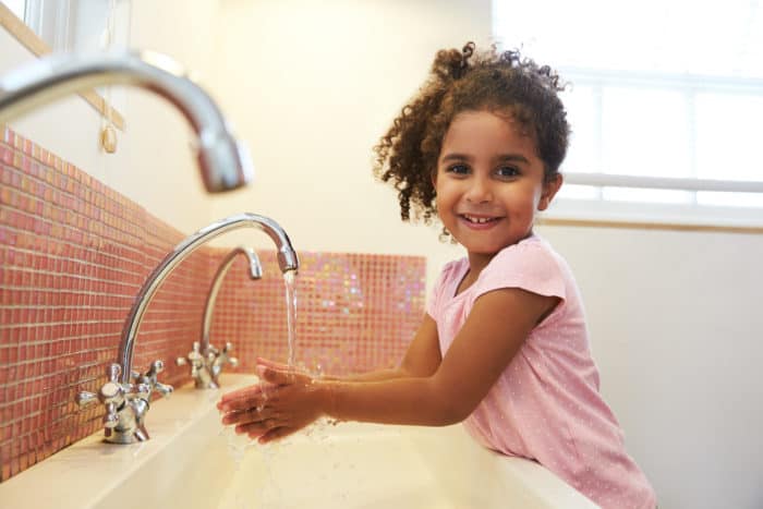 kid washing hands