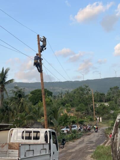 lineworkers climbing